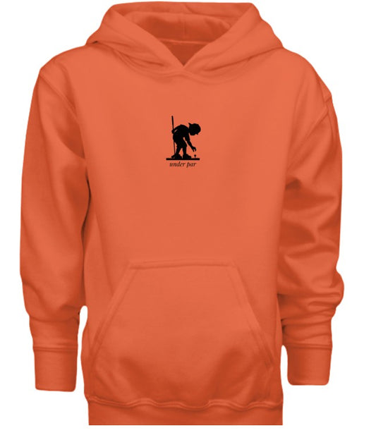 Young boy teeing golf ball hoodie